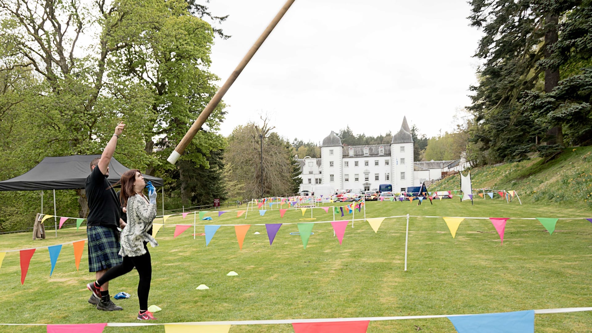 Caber tossing teambuilding exercise at Barony Castle